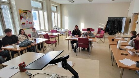 Community debates integrating displaced youth